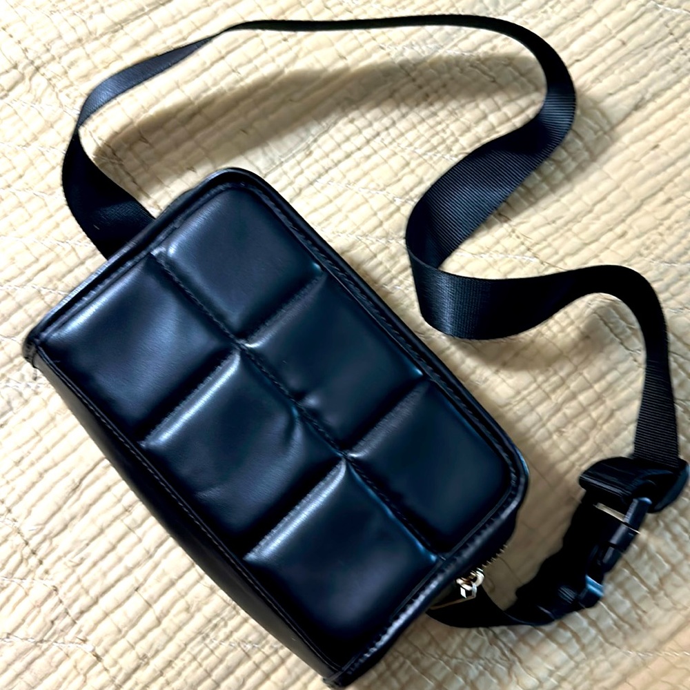Belt bag black , 32 inches on the strap/belt.wear at waist or cross body 8x5